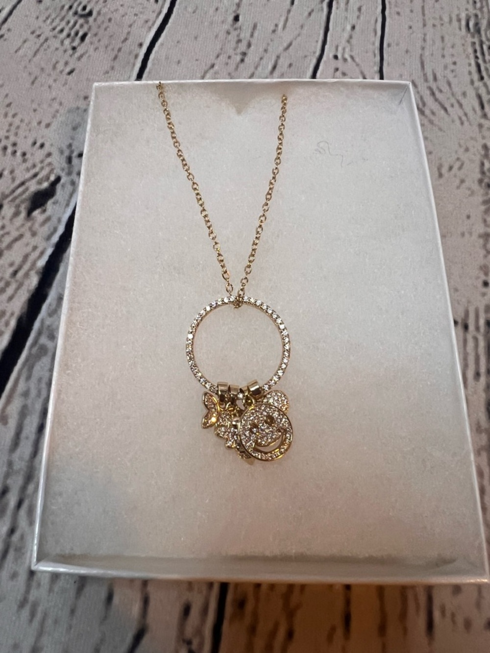 Sparkling Gold Circle Pendant Necklace with Charm Accents - Women